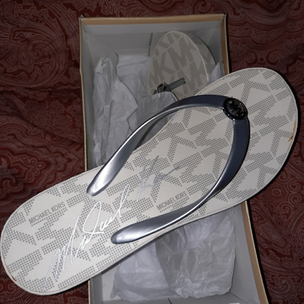 MK silver bedford flip flops